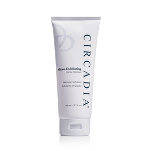 Circadia Micro-Exfoliating Honey Cleanser in a clear bottle with a pump dispenser, showing the light golden liquid inside.