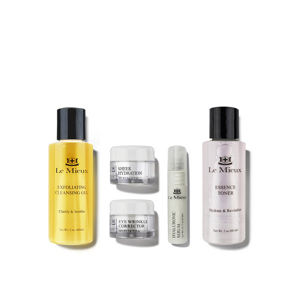 Le Mieux Clear Skin Beauty Essentials moisturizers set featuring clear bottles and sleek design on a white background.