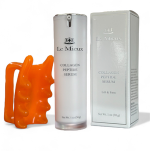 Le Mieux collagen peptide serum in a 30 ml bottle with a creamy texture and a facial massager tool beside it.