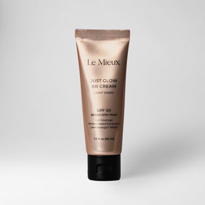 Le Mieux Just Glow BB Cream in a tube, showcasing sun protection with SPF 50 and a radiant finish.