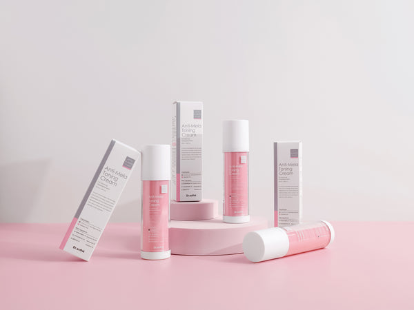 Dr. Esthe Anti-Mela Toning Toner in a 100 ml bottle, featuring a sleek design and clear liquid for brightening skin.