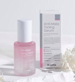 Dr. Esthe Anti-Mela Toning Serum in a clear bottle with a dropper, showcasing its lightweight, hydrating formula.