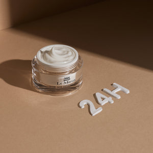 Le Mieux 24 Hr Age Defying Cream jar, a luxurious moisturizer for youthful skin, displayed on a clean surface.