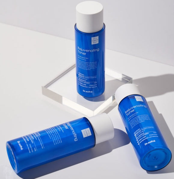 Dr. Esthe rejuvenating toner 200ml bottle with a sleek design, showcasing the label and liquid inside.