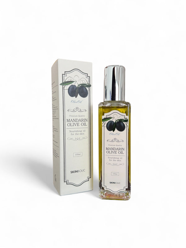 Skinbolic Mandarin Olive Oil SPF 100ml bottle with a vibrant label showcasing mandarin and olive oil ingredients.