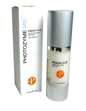Photozyme Vitamin C+E + Ferulic Acid Lotion in a sleek bottle, showcasing its rich serum texture for facial care.