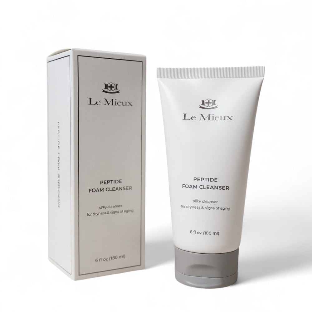 Le Mieux Anti-Aging Facial Wash Peptide Foam Cleanser in a 6oz bottle with a foamy texture displayed on a clean surface.