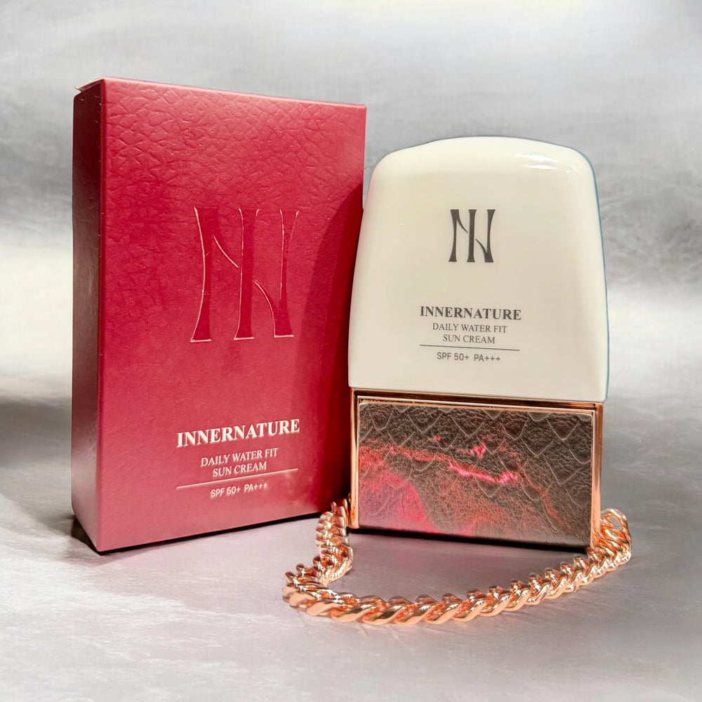 InnerNature Daily Water Fit Sun Cream bottle shown, a lightweight sun care product with hydrating and protective properties.