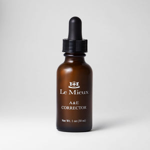 Le Mieux A&E Corrector exfoliant in 1oz bottle, with a clear liquid formulation and a white cap on a plain background.