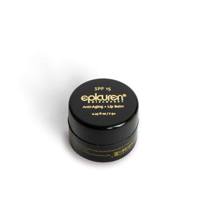 Epicuren Discovery Anti-Aging Lip Balm SPF 15 in a black pot, showcasing its smooth texture and protective formula.
