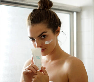 Epicuren Discovery Apricot Cream Cleanser in a lifestyle setting, showcasing its creamy texture and apricot ingredients.