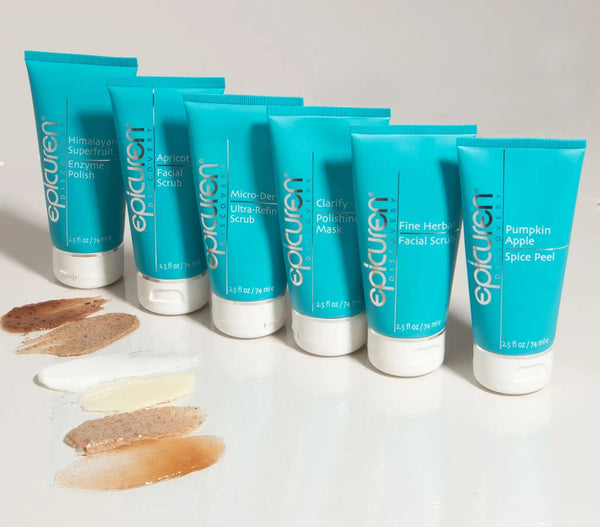 Epicuren Discovery Apricot Facial Scrub in a 2.5 Fl Oz tube surrounded by apricots and natural exfoliant ingredients.