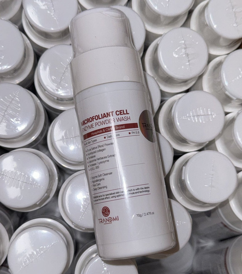 Tov Beauty Trandmi Microfoliant Cell Enzyme Powder Wash in a sleek container, showcasing its fine powder texture.