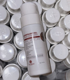 Tov Beauty Trandmi Microfoliant Cell Enzyme Powder Wash in a white container with a scoop, set against a light background.