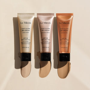 Le Mieux Just Glow BB Cream sun care product with SPF, in a sleek tube, providing a radiant, lightweight skin finish.