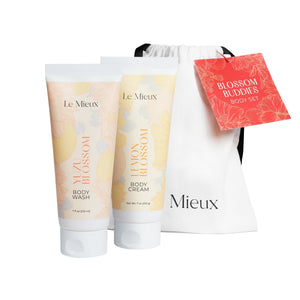 Le Mieux Blossom Buddies Body Set featuring hand cream in floral-themed packaging with vibrant colors.