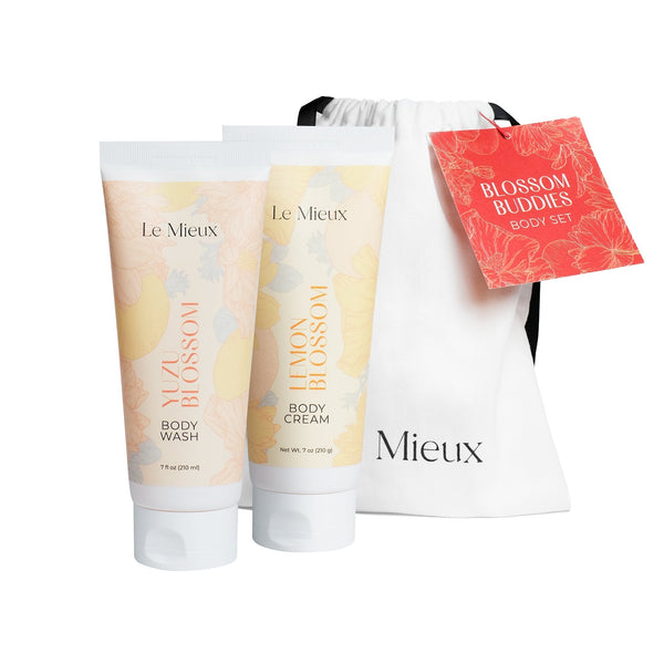 Le Mieux Blossom Buddies Body Set featuring hand cream in floral-themed packaging with vibrant colors.