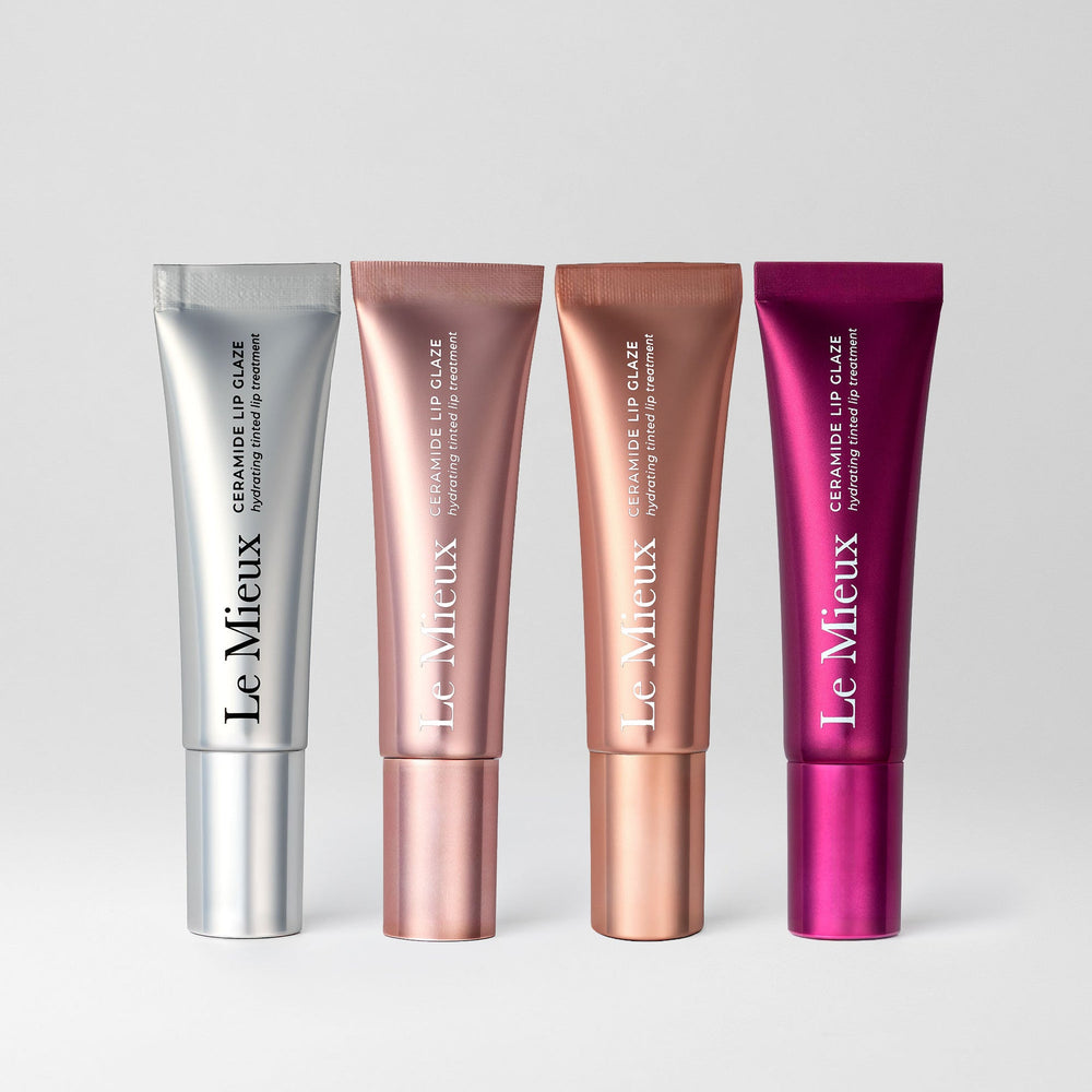 Le Mieux Ceramide Lip Glaze in a clear tube showing a glossy lip gloss with a hint of color, designed for nourishing lip care.