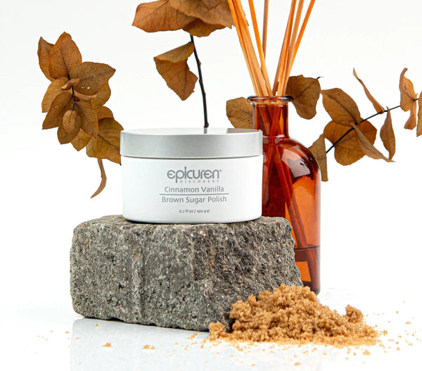 Cinnamon vanilla body scrub by Epicuren Discovery in a 6.7 fl oz container with brown sugar texture.