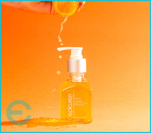 Epicuren Discovery Citrus Herbal Cleanser in a lifestyle setting, showcasing its vibrant packaging and herbal ingredients.