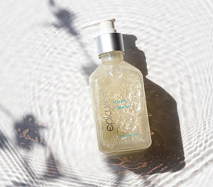 Epicuren Discovery Clarify Cleanser in a lifestyle setting, showcasing its sleek packaging and creamy texture.