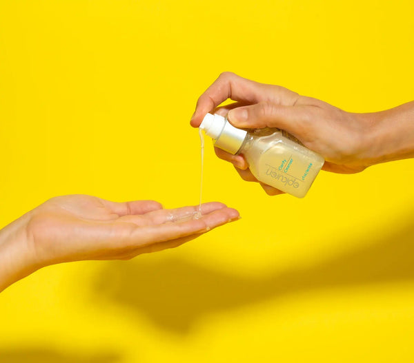 Epicuren Discovery Clarify Cleanser in a lifestyle setting, showcasing its sleek packaging and texture.