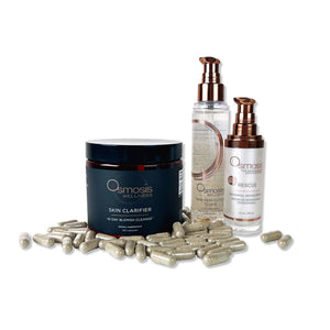 Osmosis Beauty Clarity Cleanse Set with Skin Clarifier, Rescue, and Perfection Elixir supplements in elegant packaging.