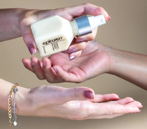 Epicuren Discovery Colostrum Luminous Glow Cream in a jar, showcasing the moisturizer's creamy texture and packaging.