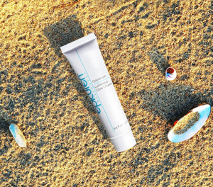 Epicuren Discovery Travel Size Colostrum Luminous Glow Cream moisturizer in a lifestyle setting, showcasing its creamy texture.