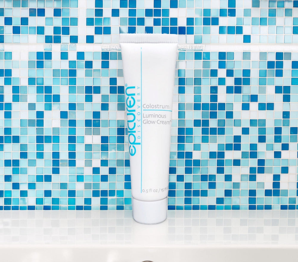 Epicuren Discovery Travel Size Colostrum Luminous Glow Cream moisturizer in a 0.5oz container on a white background.