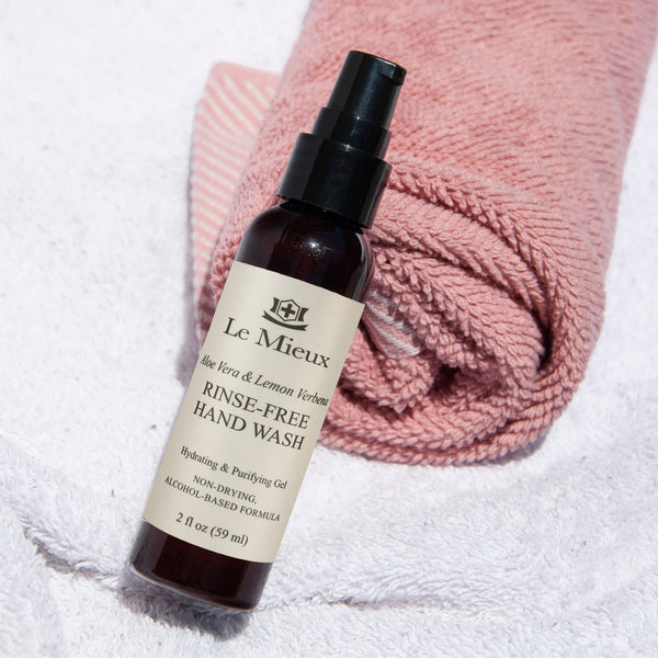 Le Mieux Aloe Vera and Lemon Verbena rinse-free hand wash bottle with label, highlighting natural ingredients and body care.