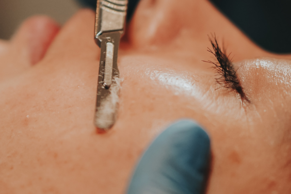 Customized facial voucher from The Aesthetics Spa featuring skincare treatment details and aesthetic design.