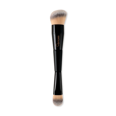 Osmosis Beauty Dual Foundation Brush with soft bristles, designed for smooth application of foundation on skin.