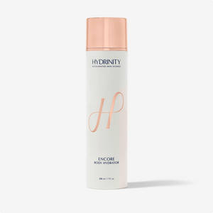 Hydrinity ENCORE Body Hydrator moisturizer in grey container, smooth creamy texture, ideal for nourishing skin.