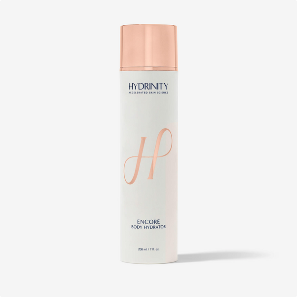 Hydrinity ENCORE Body Hydrator moisturizer in grey container, smooth creamy texture, ideal for nourishing skin.