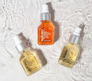 Epicuren Discovery Skin Conditioner Enzyme Toner in a 2oz bottle, surrounded by natural elements and a serene background.