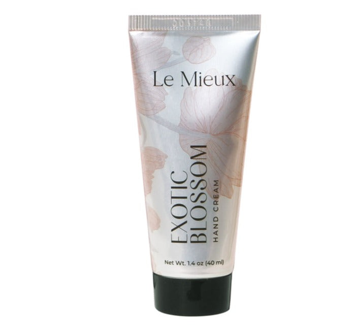 Le Mieux Exotic Blossom Hand Cream in a sleek tube, featuring a floral design and a creamy texture.