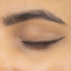 Le Mieux Eye Envy Dual Liner in brown liquid eyeliner with a sleek applicator tip for precise eye makeup application.