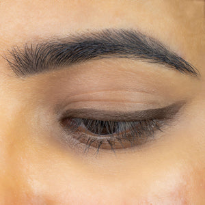 Le Mieux Eye Envy dual-tipped pencil and liquid liner in brown, showcasing the dual applicators and sleek design.