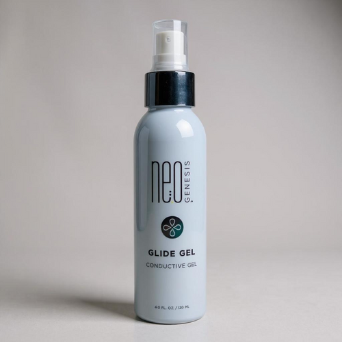 NeoGenesis Glide Gel in a clear tube, showcasing its smooth texture and gel consistency for skincare applications.