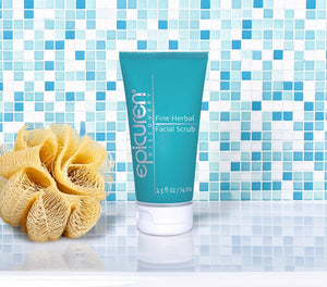 Epicuren Discovery Fine Herbal Facial Scrub in a natural setting, showcasing the exfoliant's texture and packaging.