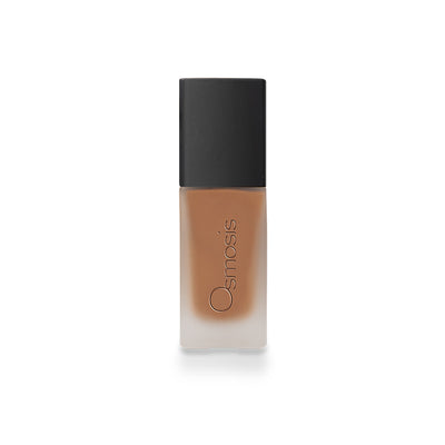 Osmosis Beauty Flawless Foundation in sleek bottle, showcasing creamy texture and natural skin finish.