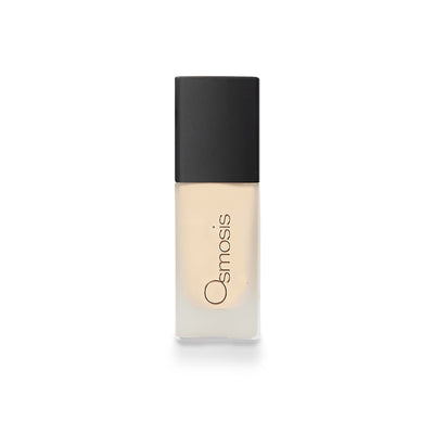 Osmosis Beauty Flawless Foundation in Sand shade, showcasing a smooth, creamy texture in a sleek container.