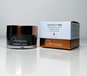 Osmosis Beauty Remedy MD Healing Balm serum in a sleek jar, showcasing its creamy texture and soothing properties.