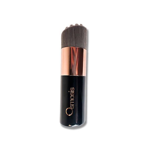 Osmosis Beauty Cleansing Kabuki Brush with soft bristles for effective skincare application and gentle cleansing.