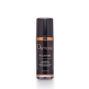 Osmosis Beauty Cranberry Enzyme Mask serum in a sleek jar with a rich red texture, surrounded by cranberries and leaves.