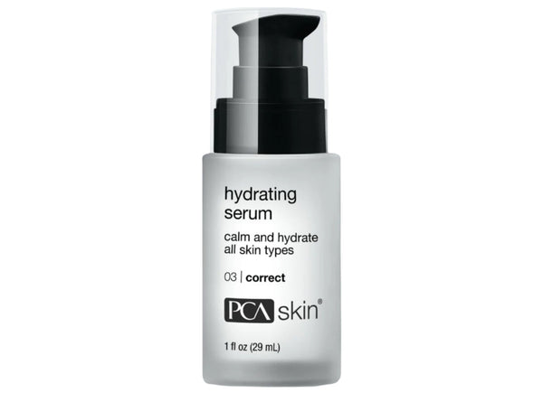 A bottle of PCA Skin Hydrating Serum, 1 fl oz, with a white and silver label, indicating it contains 0.1% vitamin C and is suitable for all skin types.
