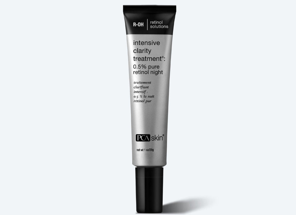 PCA Skin Intensive Clarity Treatment with 0.5% Pure Retinol and Salicylic Acid in a 1 oz bottle against a grey background.