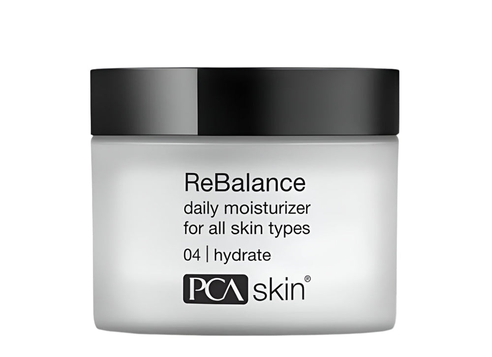 A white jar of PCA Skin ReBalance Daily Moisturizer for all skin types with a 1.7 oz label.