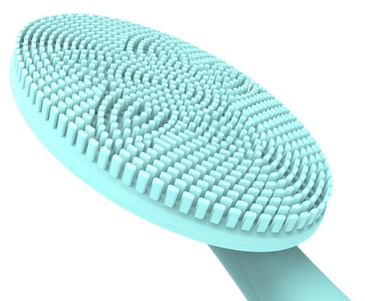 Halylo Sonic Facial Cleansing Brush with soft bristles for deep cleaning and massage, showcasing its ergonomic design.